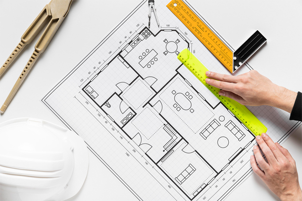 Progetto architettonico di una casa con strumenti di misurazione Progetto architettonico di una casa con strumenti di misurazione